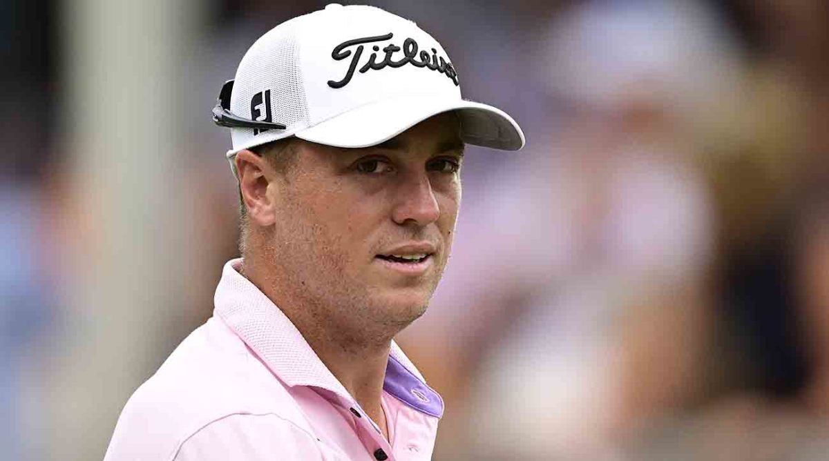 Justin Thomas of the United States reacts on the 18th green during the final round of the 2023 Wyndham Championship at Sedgefield Country Club in Greensboro, North Carolina.