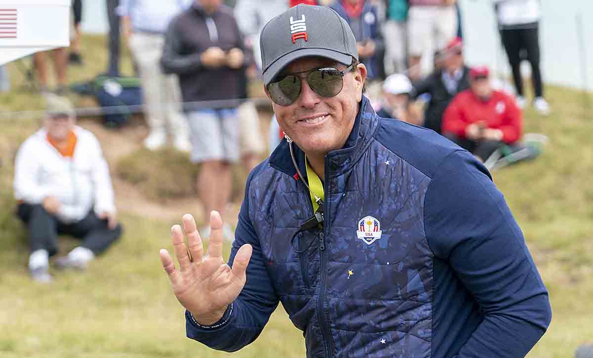 U.S. Team vice-captain Phil Mickelson waves to the fans along the 8th hole during a practice round for the 43rd Ryder Cup golf competition at Whistling Straits.