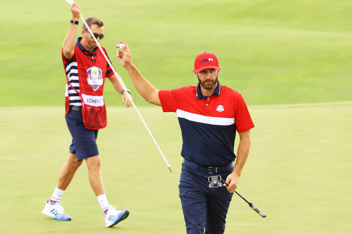  Dustin Johnson of team United States celebrates during Sunday Singles Matches of the 43rd Ryder Cup at Whistling Straits on September 26, 2021 in Kohler, Wisconsin.