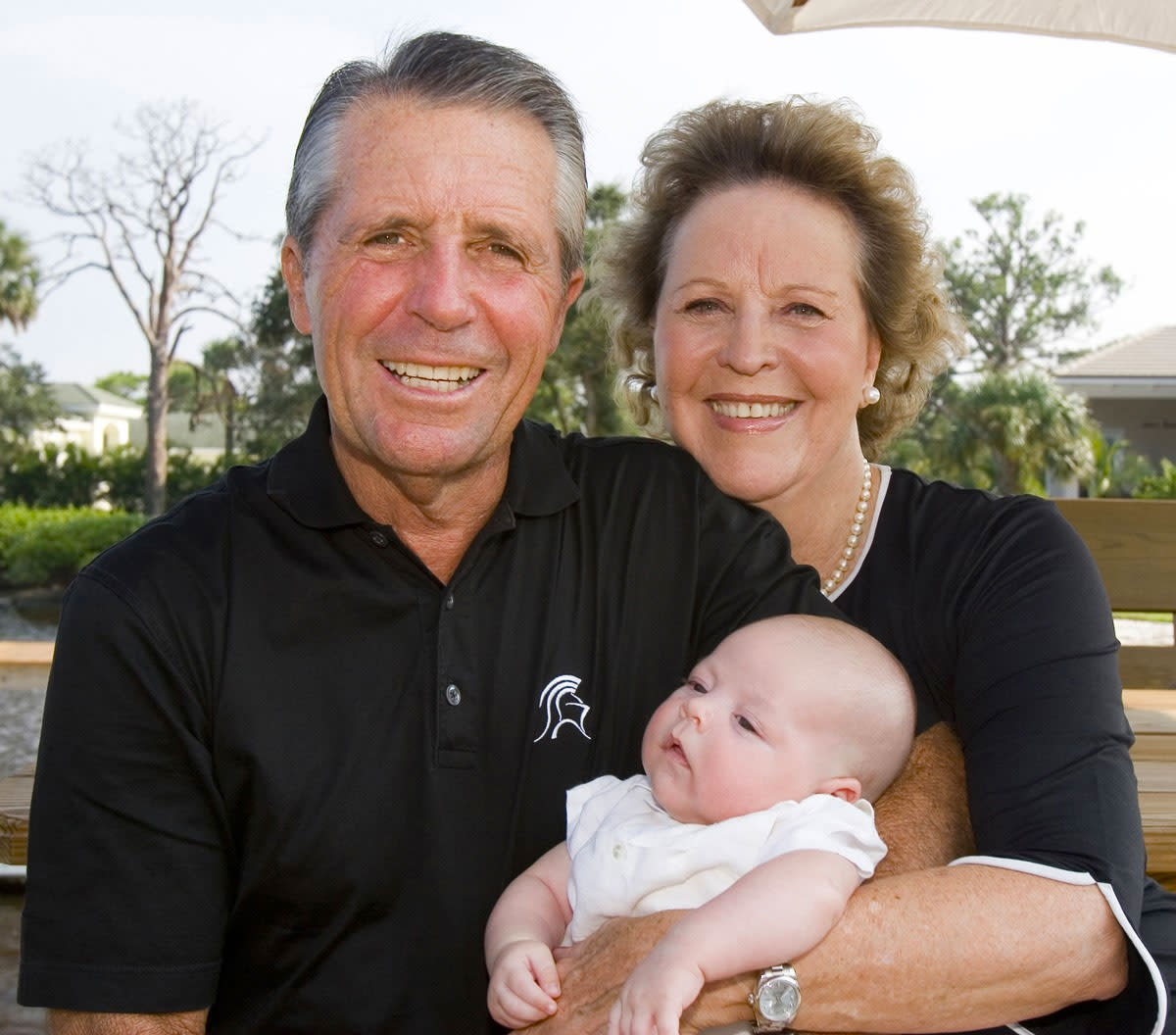 Gary and Vivienne Player with Sebastian, one of their great grandchildren.