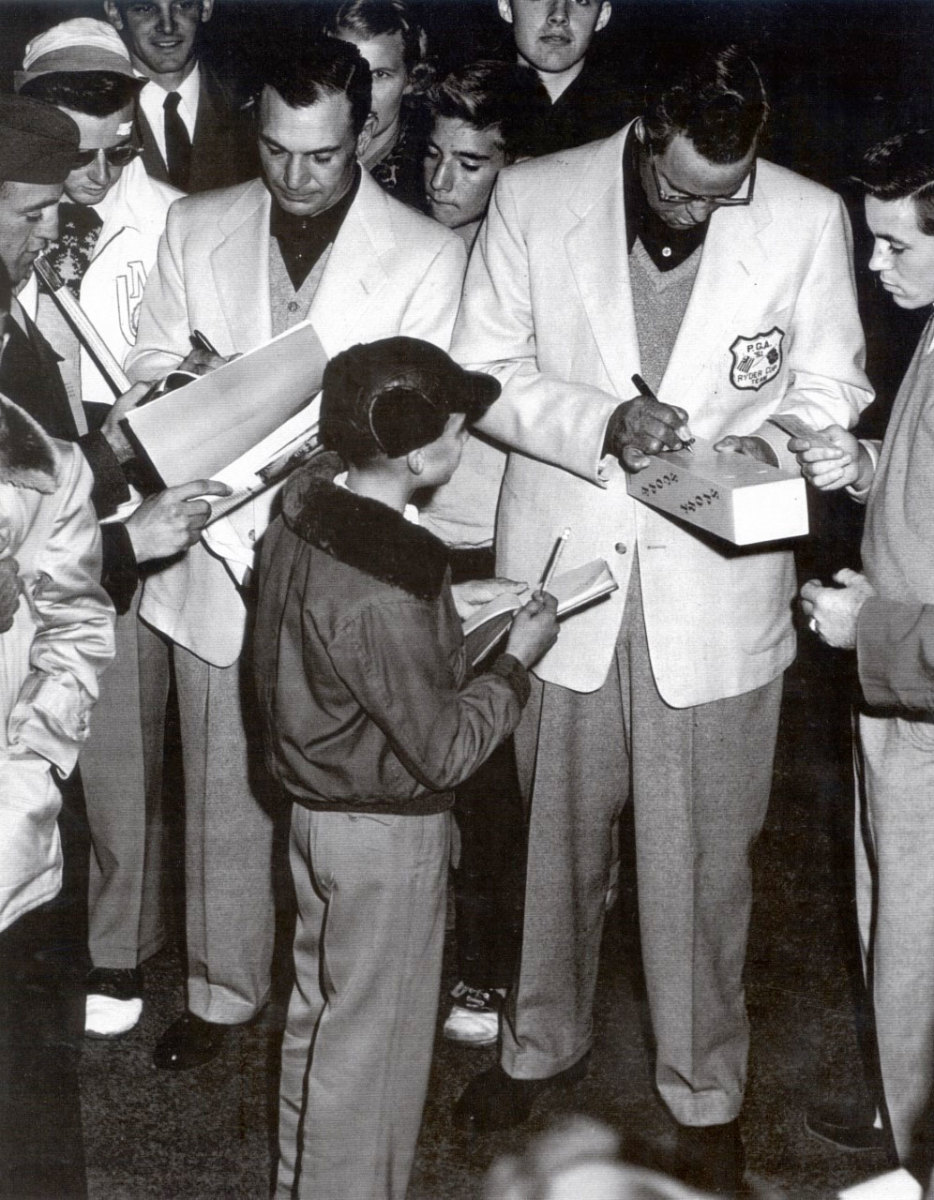 1951 American Ryder cup team members Ben Hogan (left) and Skip Alexander sign autographs.