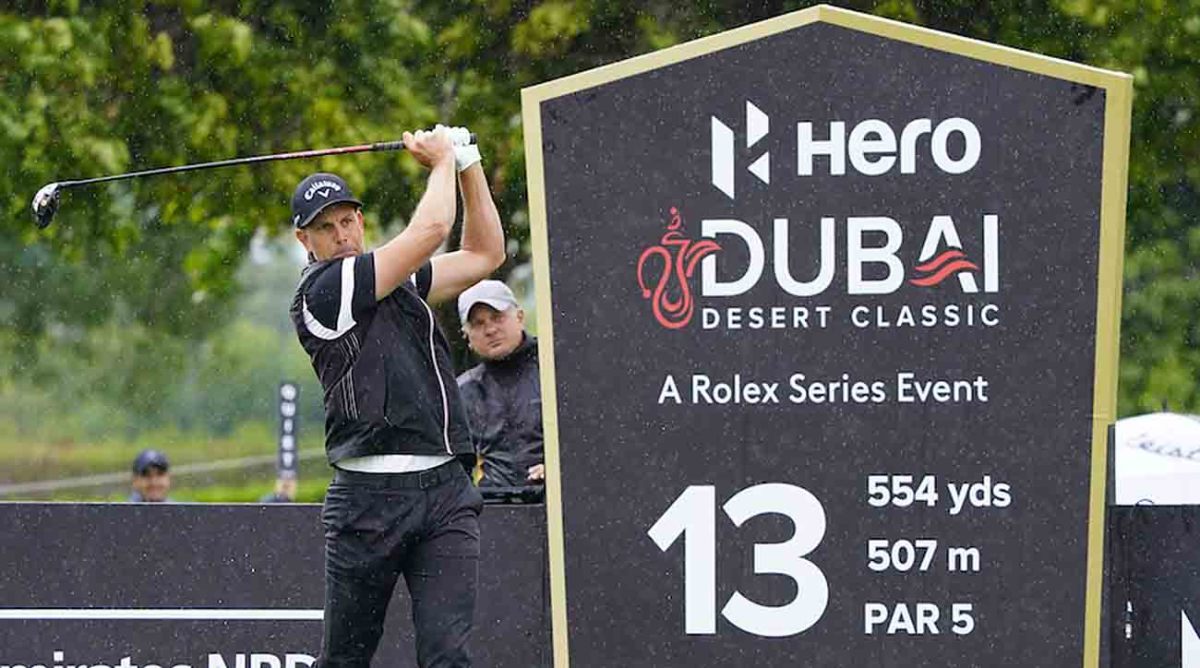 Henrik Stenson watches a tee shot at the 2023 Hero Dubai Desert Classic.
