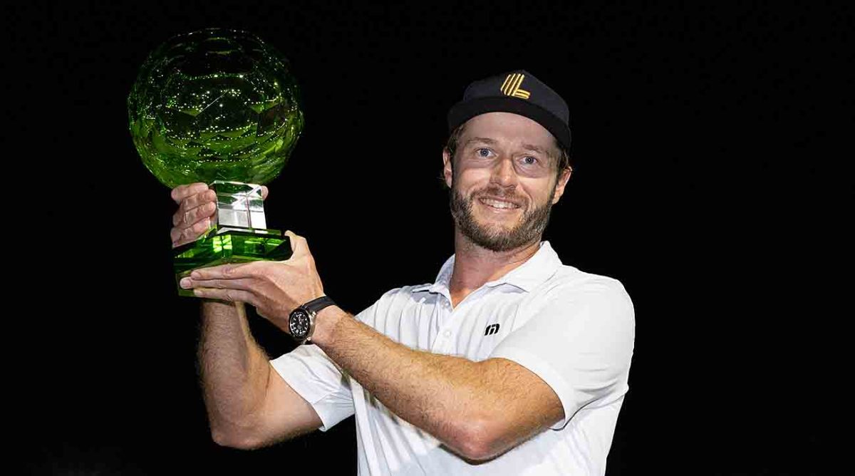 First-place winner Kalle Samooja of Finland poses with the trophy after the final round of the LIV Golf Promotions at the Abu Dhabi Golf Club on Sunday, Dec. 10, 2023 in Abu Dhabi, United Arab Emirates.