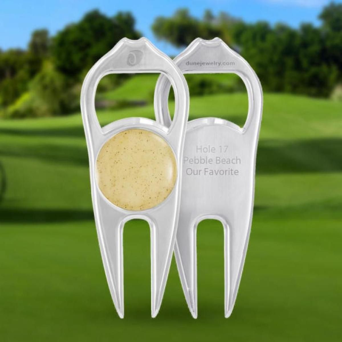 COURTESY OF DUNE JEWELRY Dune Jewelry can transform an item such as a divot tool into a golf memory.