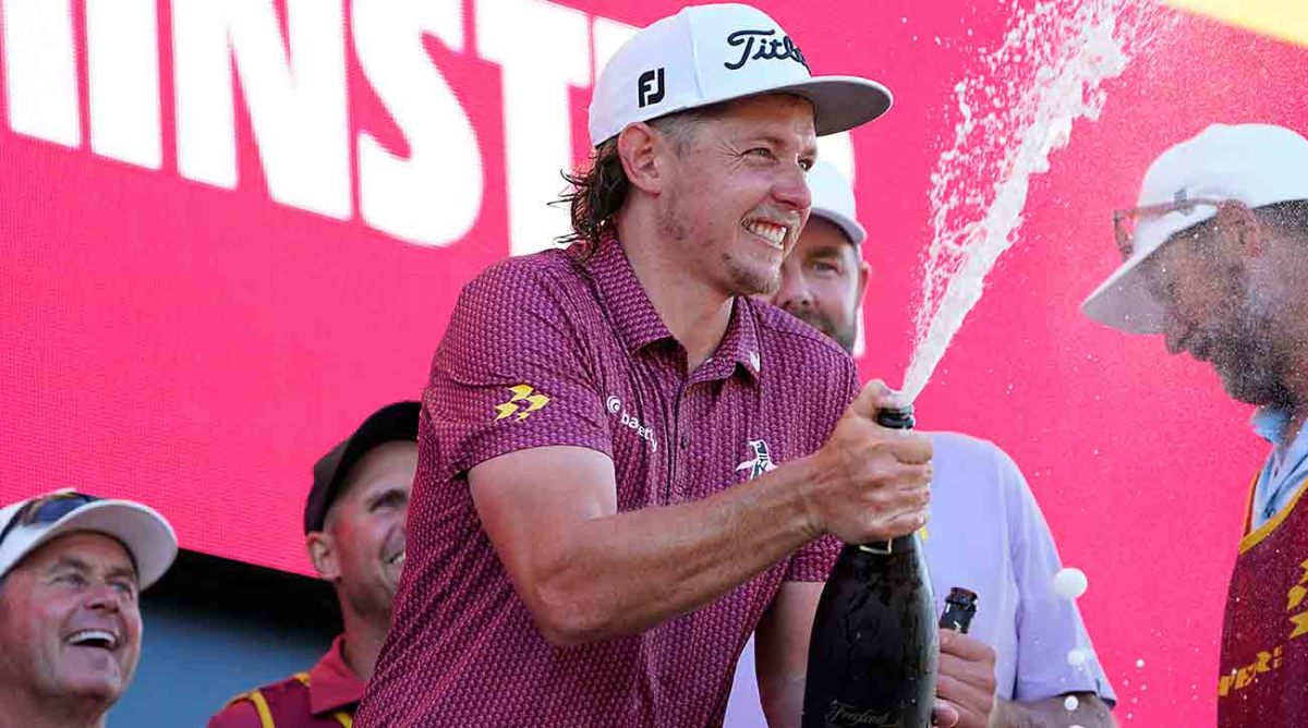 Cameron Smith sprays champagne as his Ripper GC are the champions of the LIV Golf Bedminster golf tournament at Trump National Bedminster on Sunday, Aug. 13, 2023.