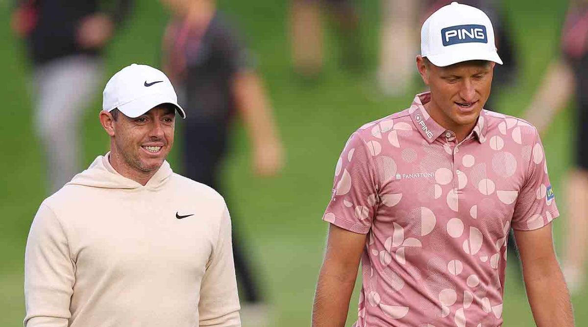 Rory McIlroy of Northern Ireland and Adrian Meronk of Poland walk on the 12th hole during Day One of the 2023 Horizon Irish Open at The K Club in Straffan, Ireland.