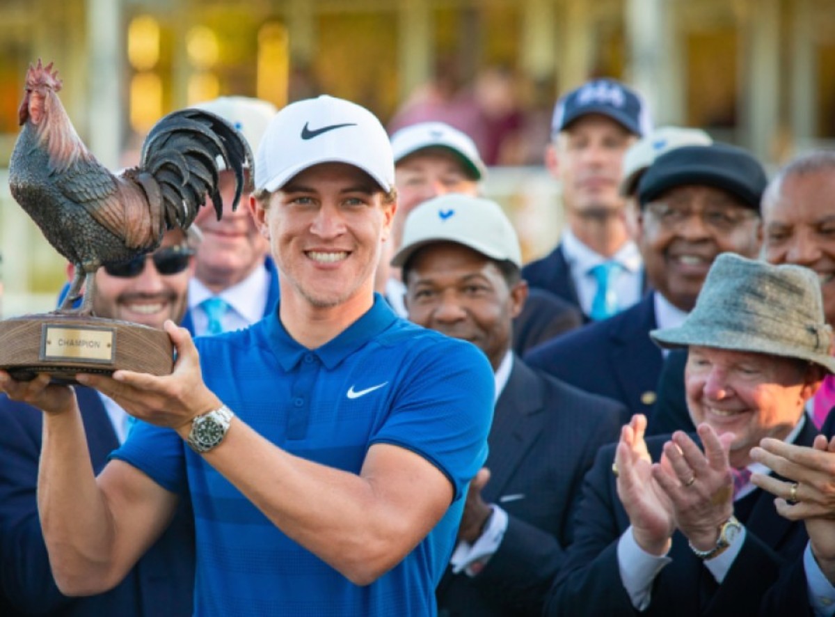 Cameron Champ, winner of the 2018 Sanderson Farms Championship, looks as proud as a rooster. In fact, so does Joe Sanderson (right), the chief executive of the tournament sponsor.