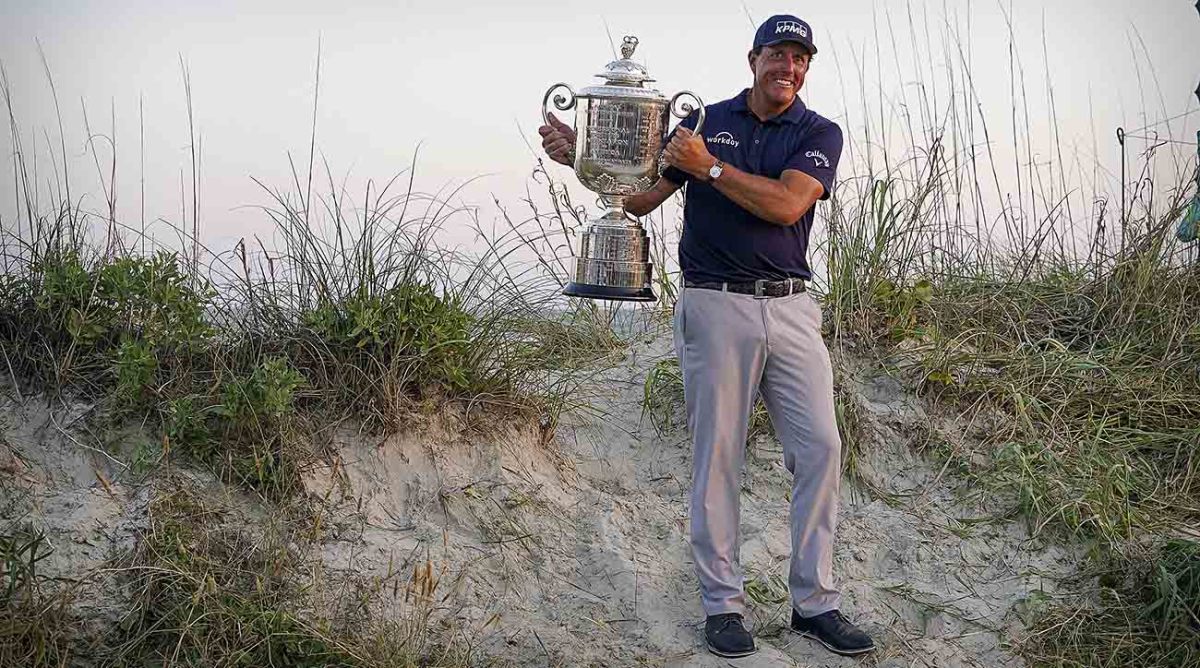 Phil Mickelson poses with the trophy after winning the 2021 PGA Championship at Kiawah Island, S.C.