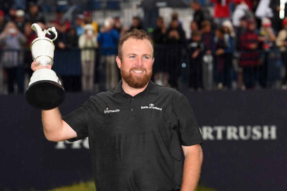 Ireland’s Shane Lowry rejoices with the Claret Jug after his 6-stroke victory Sunday in the 148th British Open at Royal Portrush in Northern Ireland.