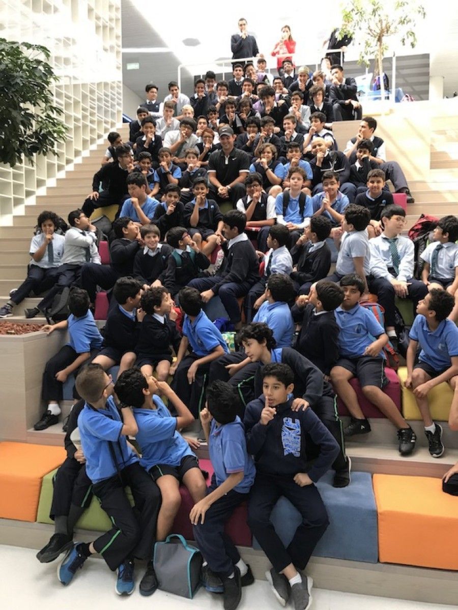 Students from World Academy, a K-12 school in King Abdullah Economic City, Saudi Arabia, remind American Patrick Reed to keep it quiet in the halls of academia. Perhaps the kids recall seeing Reed shush the Gleneagles crowd in a similar manner at the 2014 Ryder Cup.