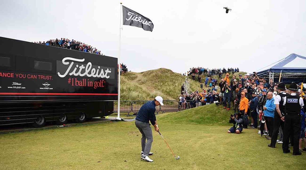 Jordan Spieth plays from the driving range alongside the 13th hole during the final round of the 2017 British Open.