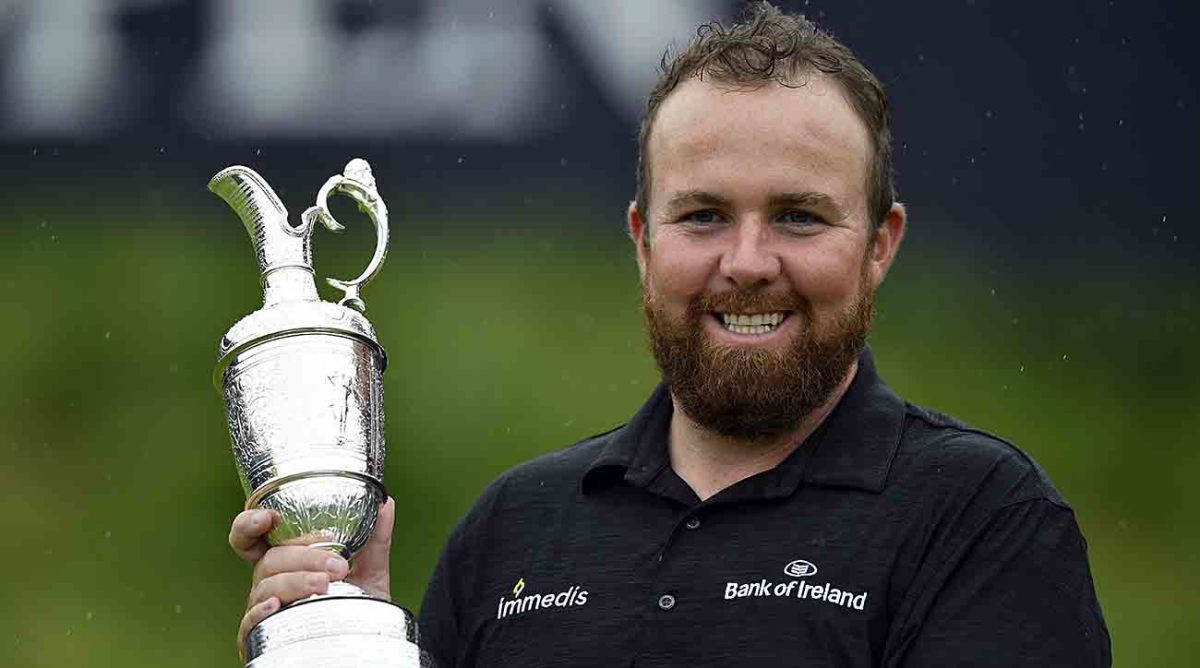 Shane Lowry poses with the Claret Jug after winning the 2019 British Open.