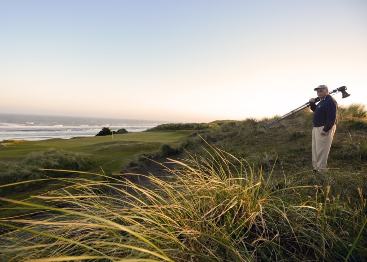 Morning Read's Alex Miceli stands aside the 11th hole at Bandon Dunes Golf Resort's Pacific Dunes as the sun rises on his round.