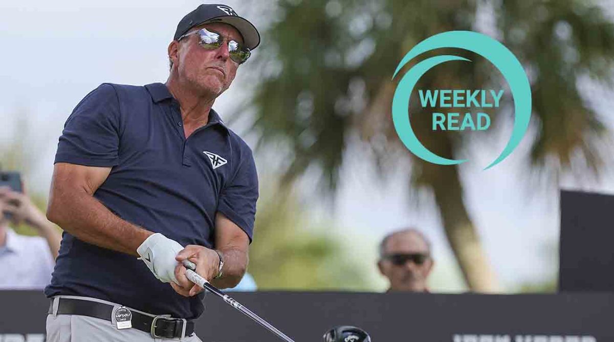 Phil Mickelson plays his shot from the 14th tee during the first round of the 2023 LIV Golf Miami team championship at Doral, along with the SI Golf Weekly Read logo.