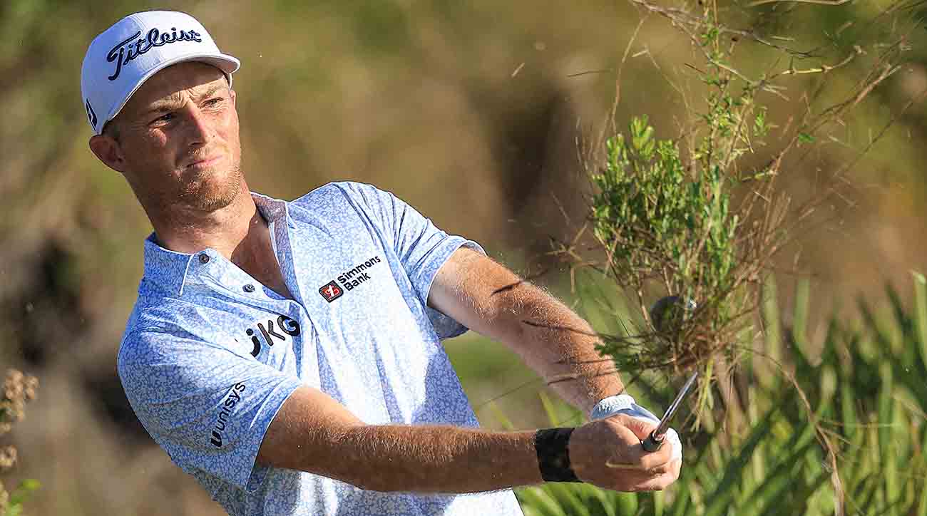 Will Zalatoris plays his second shot on the 18th hole during the third round of the 2023 Hero World Challenge at Albany Golf Course in Nassau, Bahamas.