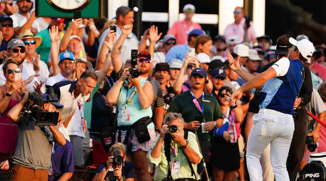 Viktor Hovland tosses his ball off the 18th green after winning the 2023 Tour Championship at East Lake Golf Club.