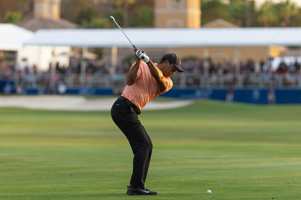 Tiger Woods hits a shot on the 18th hole at the 2021 PNC Championship.