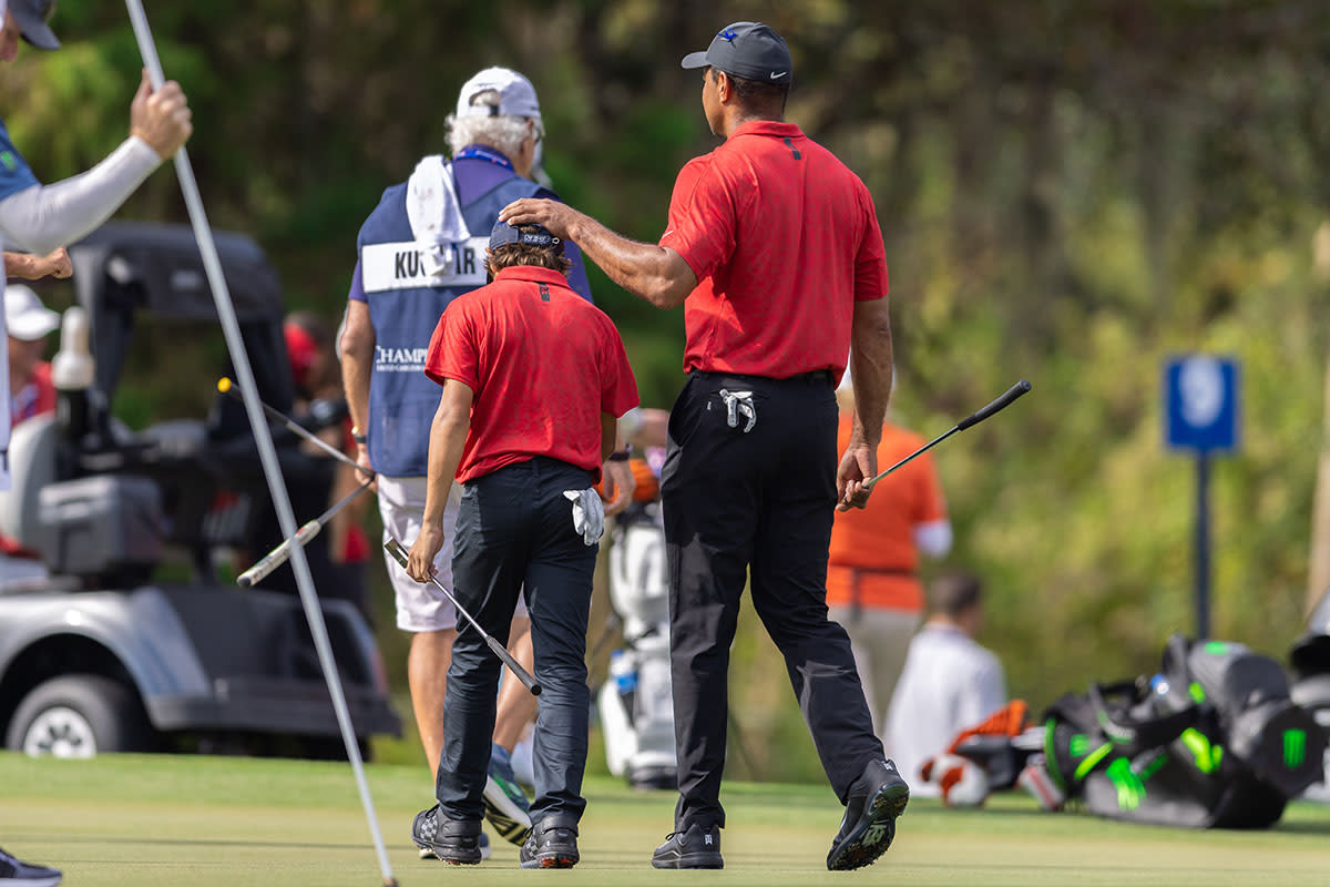 Tiger Woods and Charlie on Sunday at the PNC Championship.
