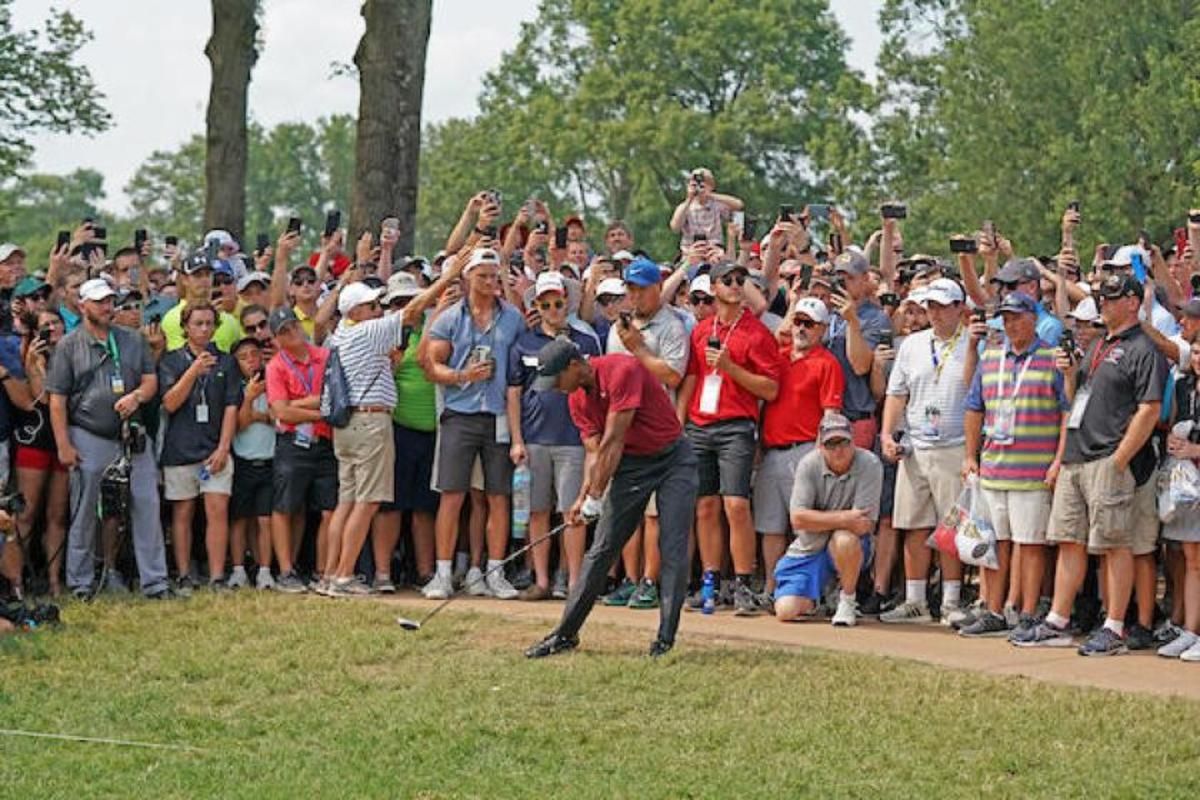 Tiger Woods draws a crowd Sunday during the final round of the PGA Championship at Bellerive Country Club in St. Louis.