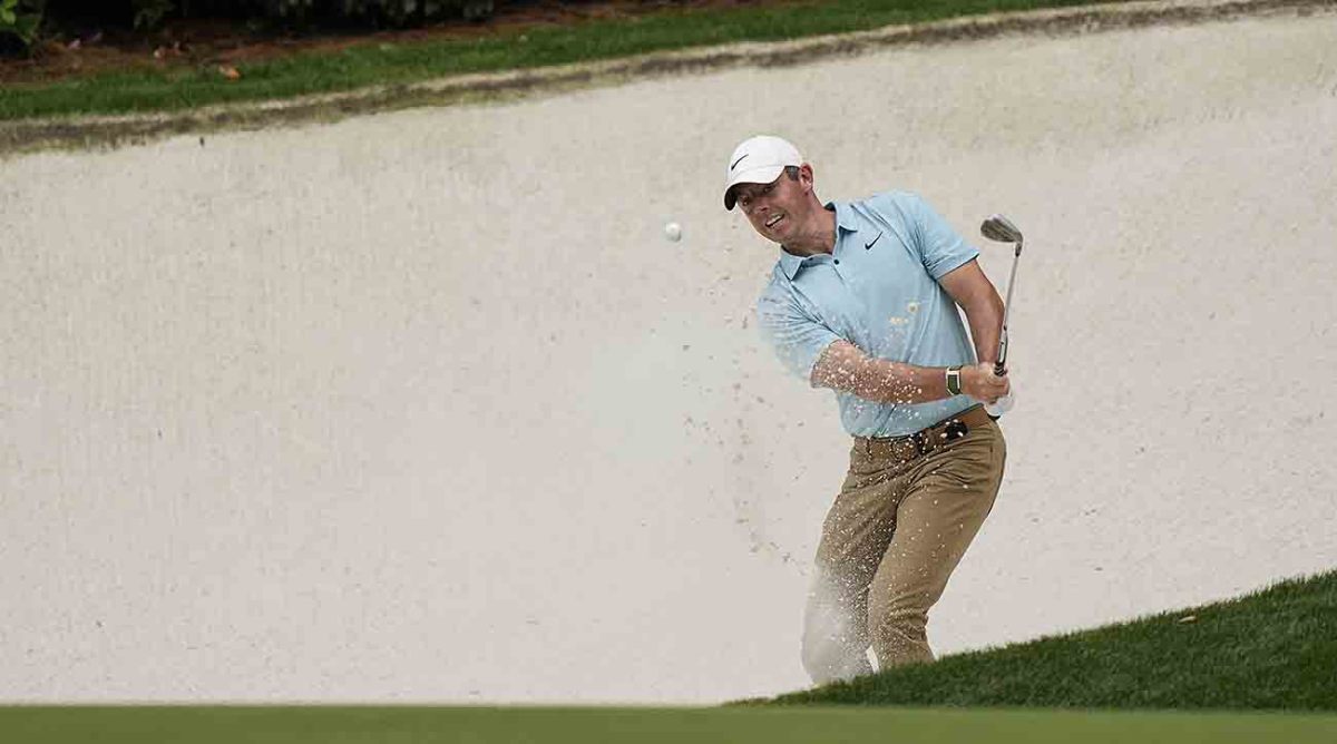 Rory McIlroy plays from a bunker at the 2023 Masters.
