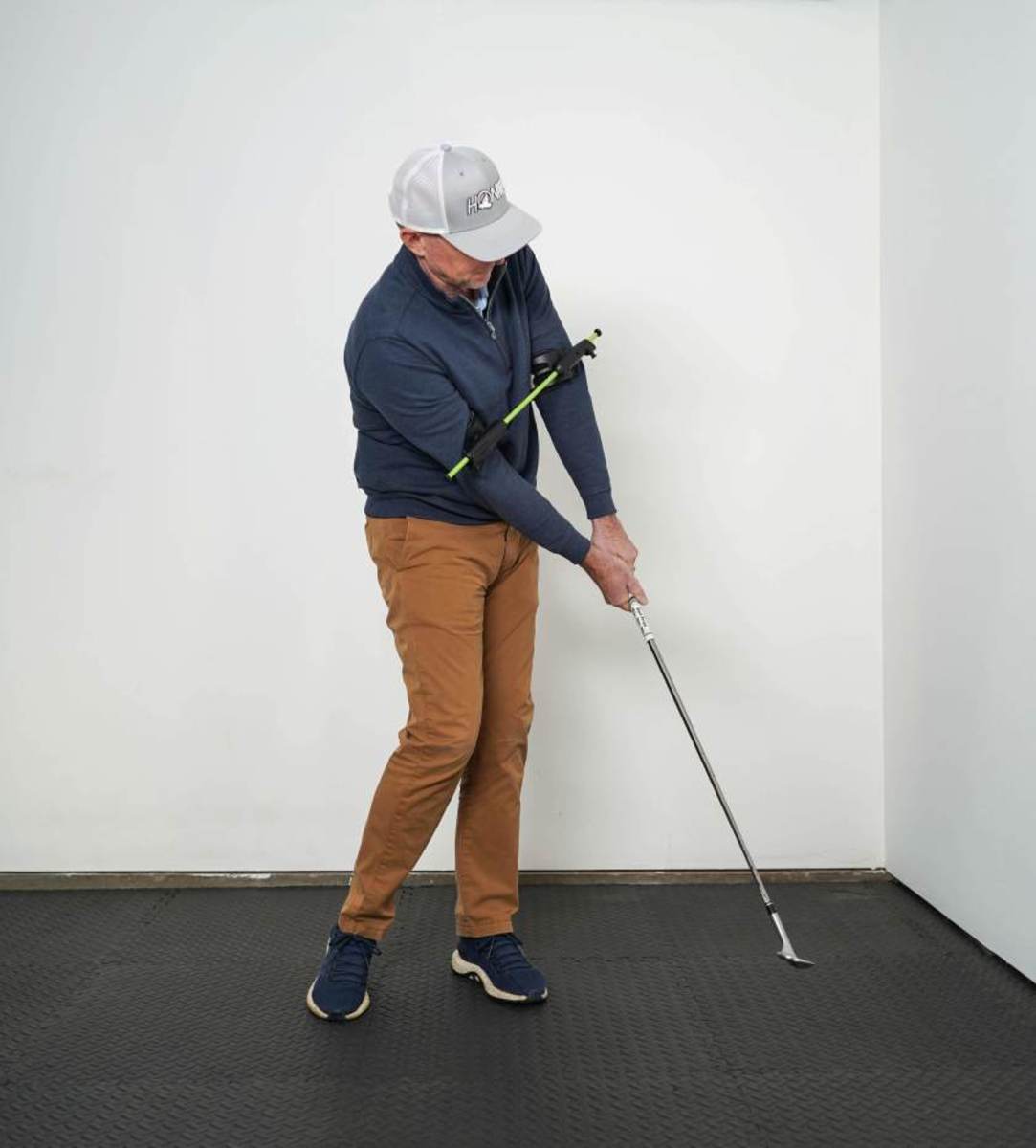 The Swing Align helps a golfer get the shoulders in a proper position at address and on plane.