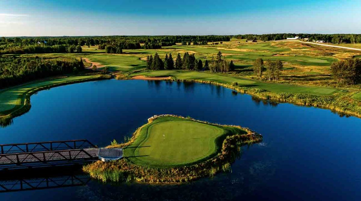 The island 15th hole at Sweetgrass Golf Club