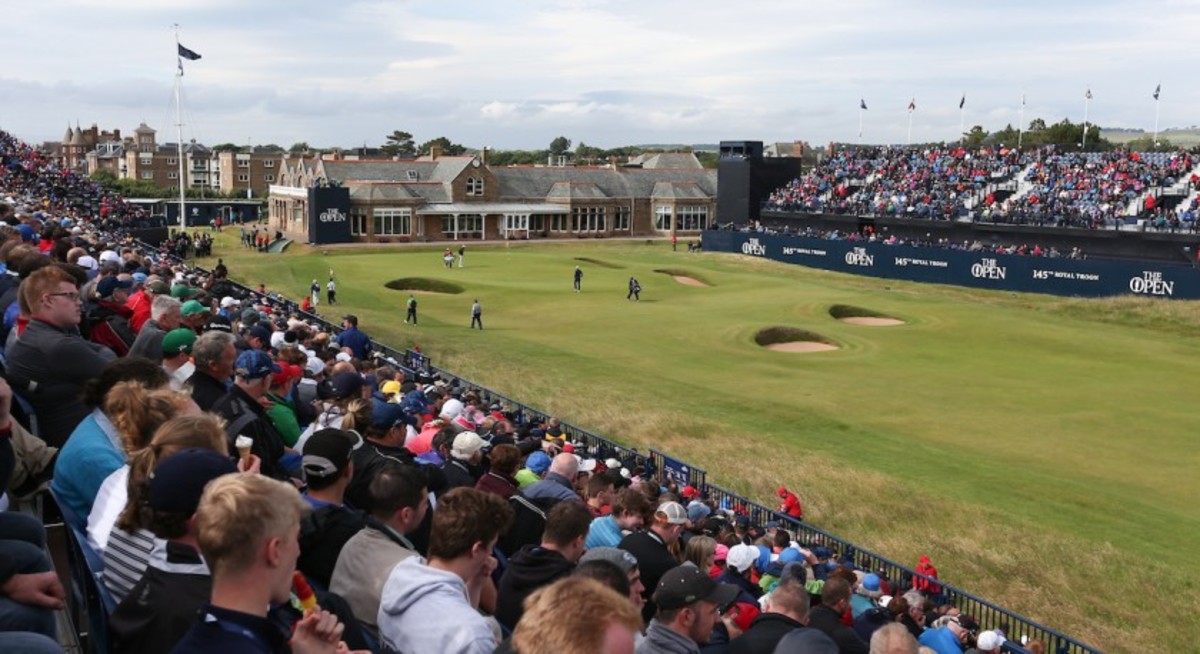 Golf fans line the 18th hole at the 2016 British Open at Royal Troon, which will play host to golf’s oldest major championship again in 2023, the R&A announced. 