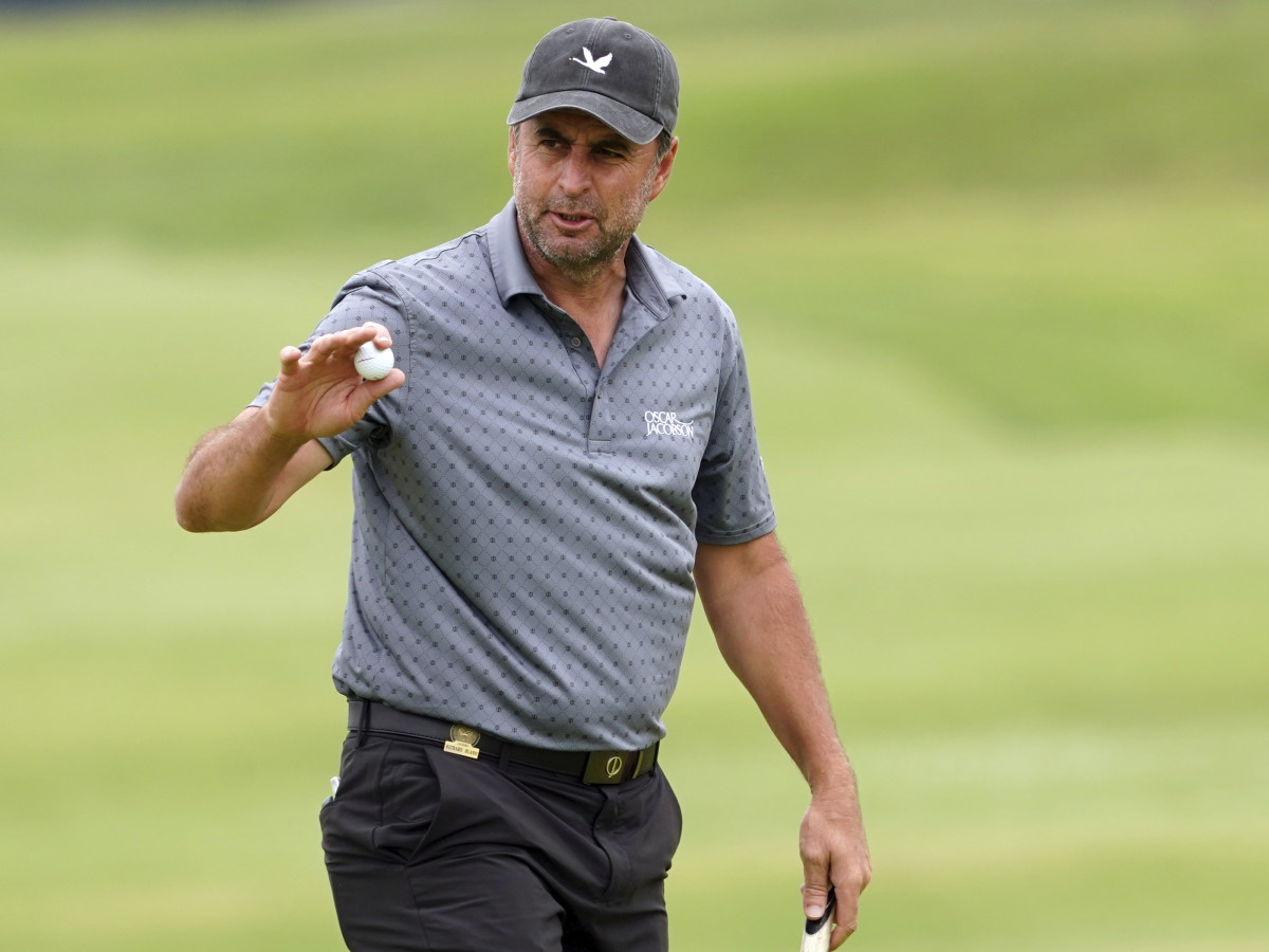 Richard Bland waves after his putt on the ninth green during the second round of the U.S. Open golf tournament at Torrey Pines Golf Course.