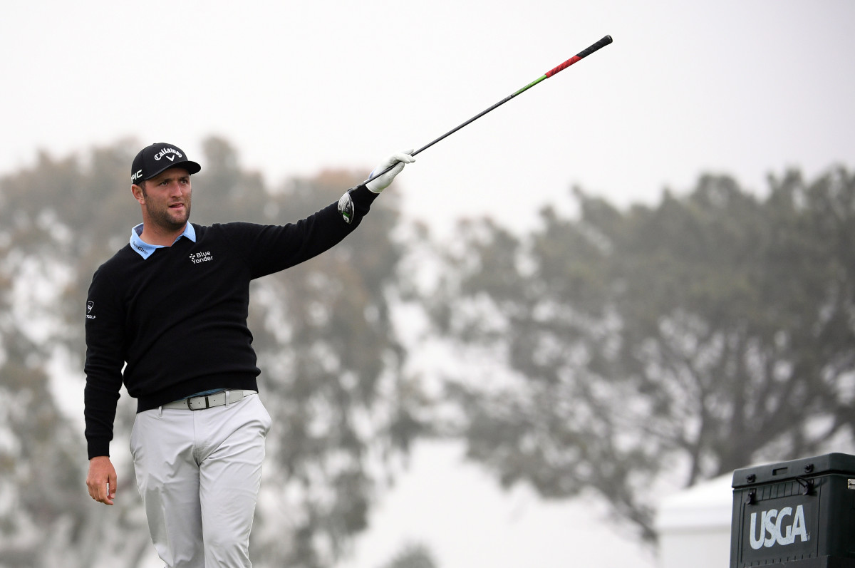 Jon Rahm signals left after his shot from the second tee during the U.S. Open's second round at Torrey Pines Golf Course.