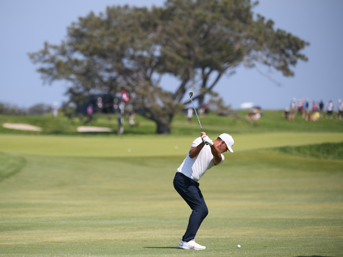 Brooks Koepka plays his shot from the 14th fairway during the first round of the 2021 U.S. Open at Torrey Pines.
