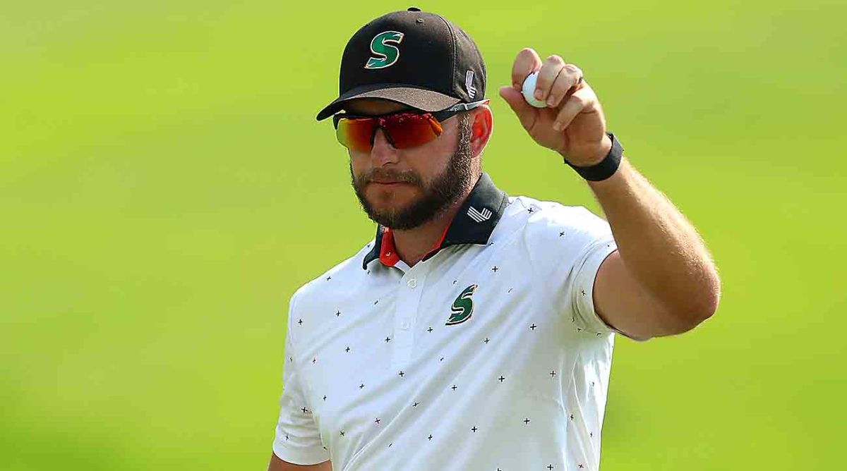 Dean Burmester of South Africa celebrates victory on the 18th green after winning the 2023 Joburg Open in Johannesburg, South Africa.