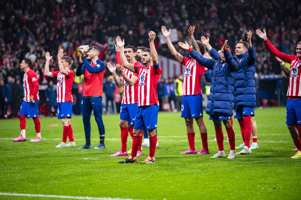 Atletico Madrid players pictured celebrating in front of their fans after beating Real Madrid 4-2 in the Copa del Rey in January 2024