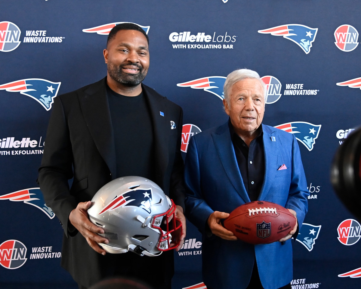 Jan 17, 2024; Foxborough, MA, USA; New England Patriots head coach Jerod Mayo (L) and owner Robert Kraft (R) pose for photos after a press conference announcing Mayo's hiring as the team's head coach at Gillette Stadium.