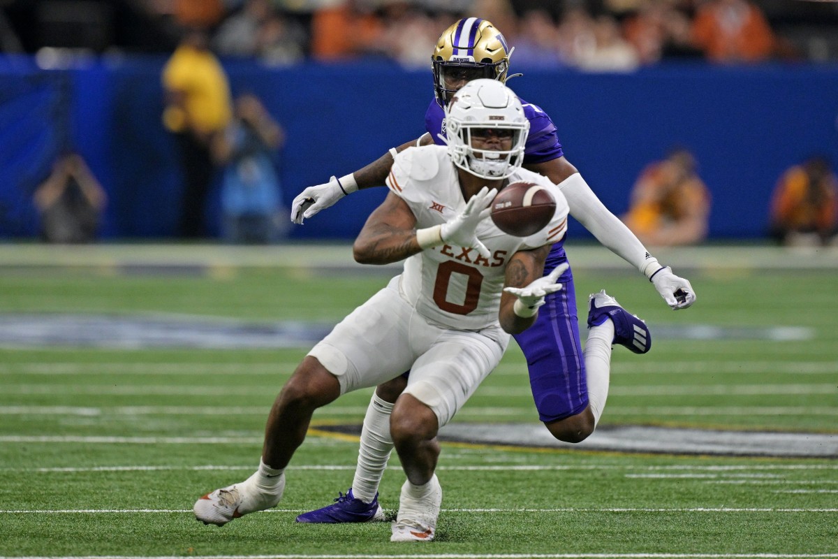 Jan 1, 2024; New Orleans, LA, USA; Texas Longhorns tight end Ja'Tavion Sanders (0) makes a catch during the third quarter against the Washington Huskies in the 2024 Sugar Bowl college football playoff semifinal game at Caesars Superdome. Mandatory Credit: Matthew Hinton-USA TODAY Sports  
