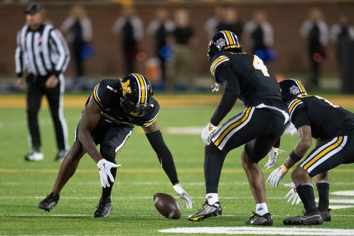 Missouri defensive back Jaylon Carlies (1) recovers a fumble from Tennessee quarterback Joe Milton III (7) during an NCAA college football game on Saturday, November 11, 2023 in Columbia, MO.  