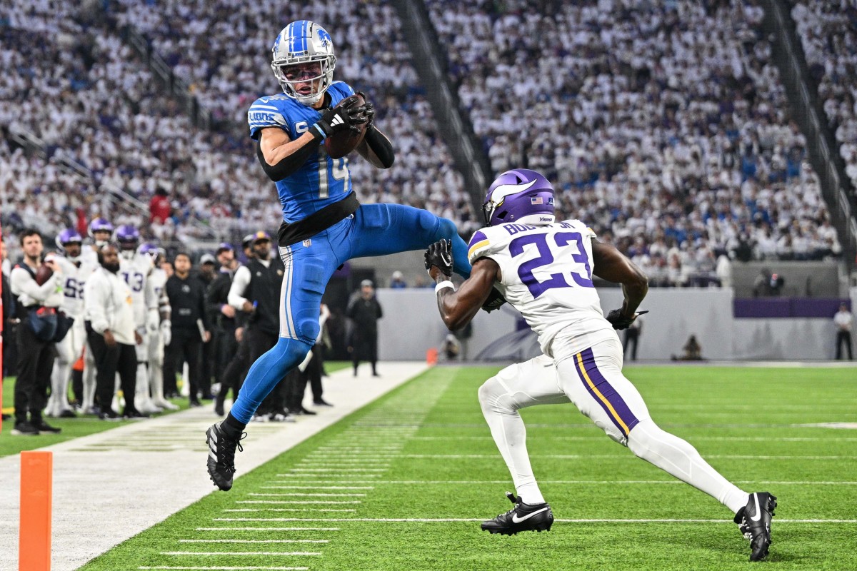 Detroit Lions wide receiver Amon-Ra St. Brown catches a pass against the Minnesota Vikings.