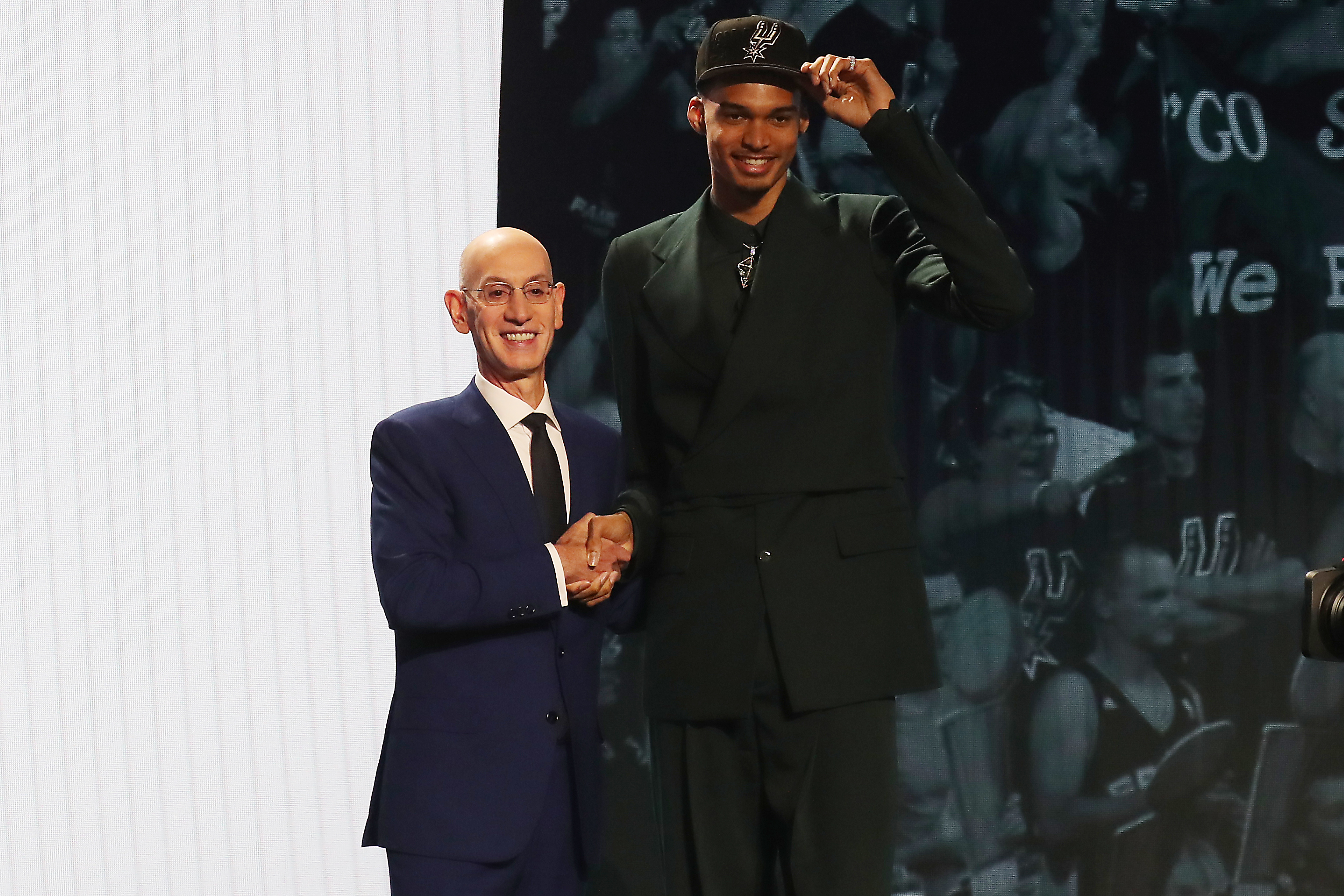 Jun 22, 2023; Brooklyn, NY, USA; Victor Wembanyama poses for photos with NBA commissioner Adam Silver after being selected first by the San Antonio Spurs in the first round of the 2023 NBA Draft at Barclays Arena.