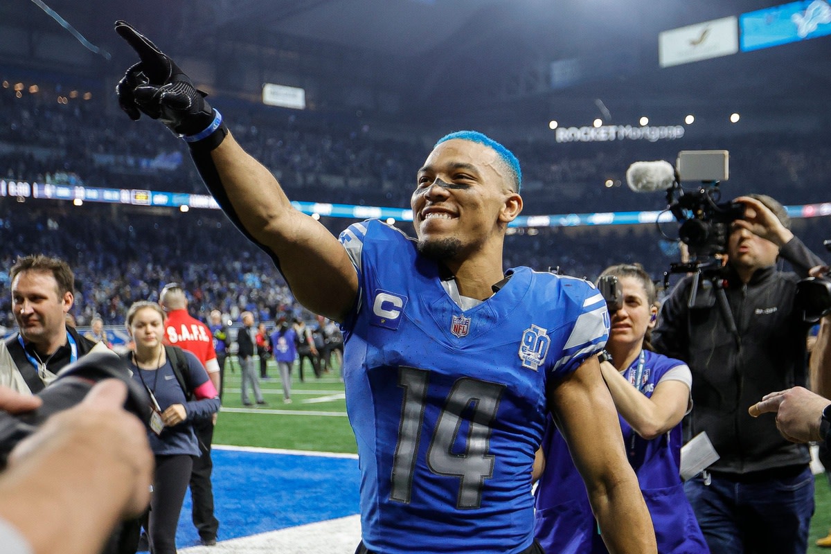 Detroit Lions wide receiver Amon-Ra St. Brown celebrates the 31-23 win over the Tampa Bay Buccaneers in the NFC divisional round at Ford Field in Detroit on Sunday, Jan. 21, 2024.  
