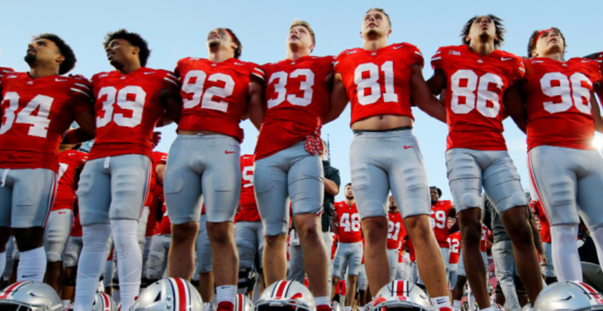 Ohio State Buckeyes players celebrate after a college football game in the Big Ten.