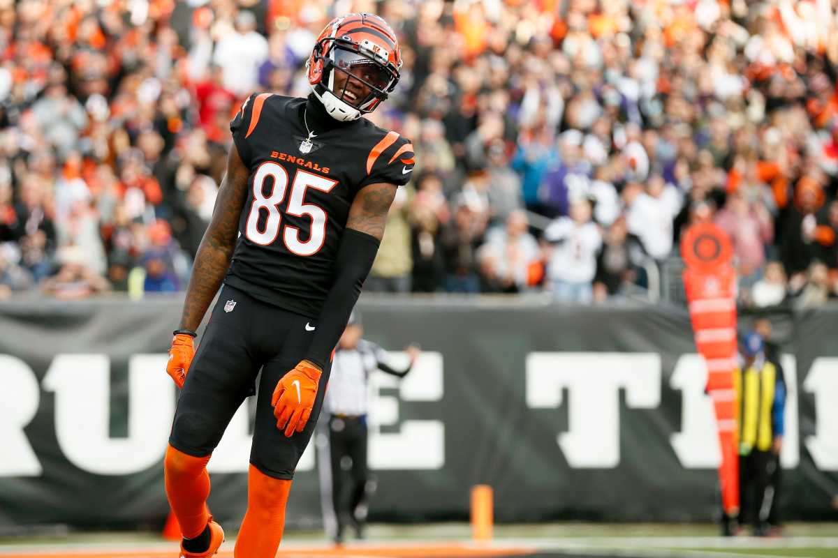 Cincinnati Bengals wide receiver Tee Higgins (85) smiles as he scores a touchdown in the fourth quarter of the NFL Week 16 game between the Cincinnati Bengals and the Baltimore Ravens at Paul Brown Stadium in downtown Cincinnati on Sunday, Dec. 26, 2021. 