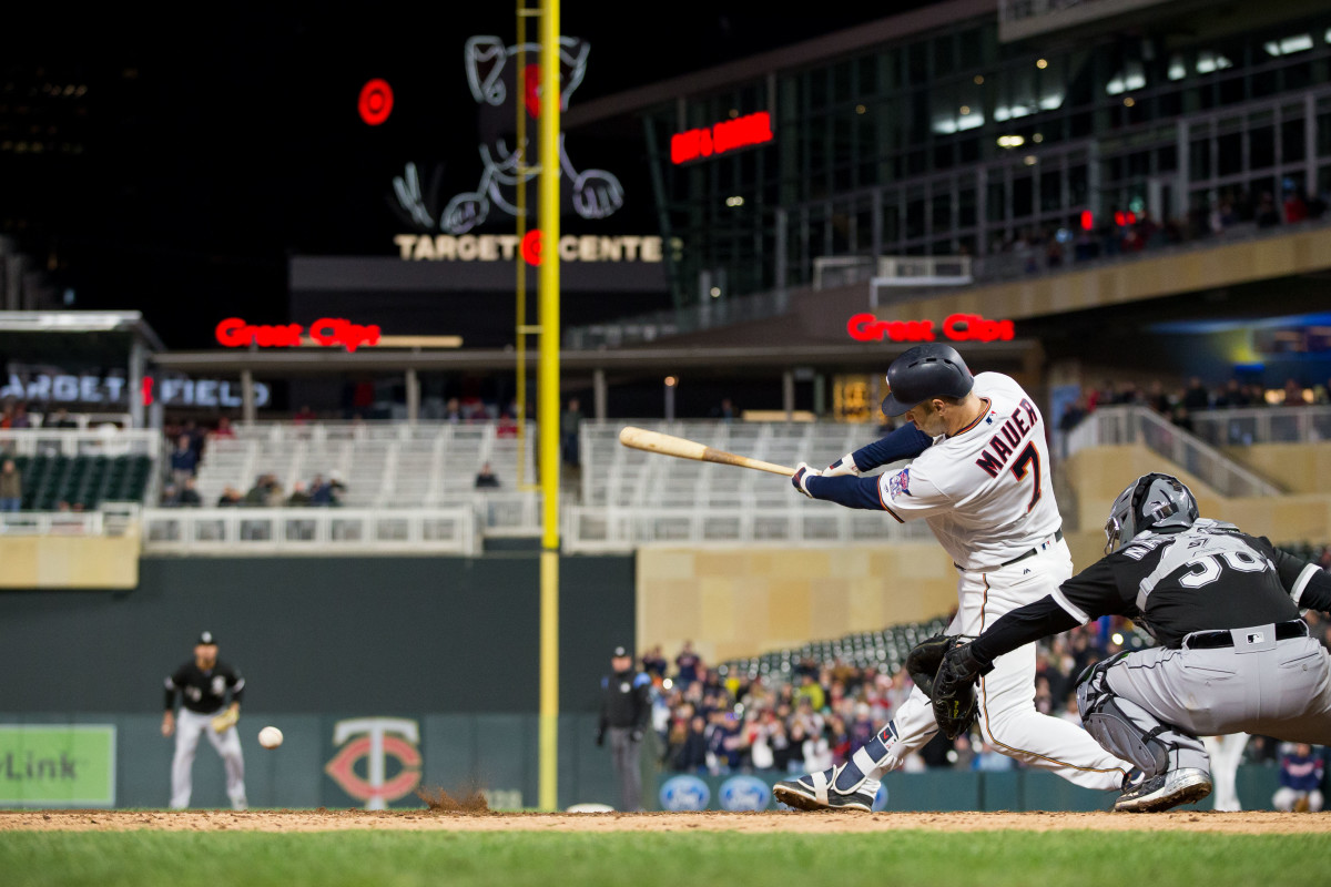Apr 12, 2018; Minneapolis, MN, USA; Minnesota Twins first baseman Joe Mauer (7) singles in the seventh inning against Chicago White Sox for his 2000th career hit at Target Field.