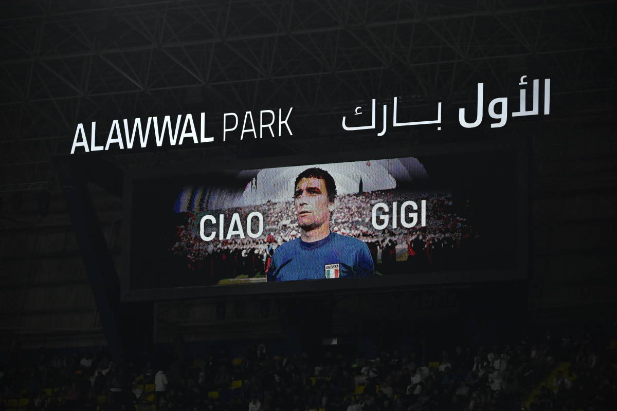 An image of Luigi "Gigi" Riva pictured on a giant screen at the Supercoppa Italiana final in January 2024 shortly after he died aged 79 in Sardinia