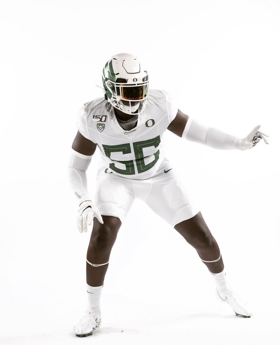 2025 Lewisville (Tex.) offensive tackle Michael Fasusi poses during a photoshoot on a visit to the University of Oregon.