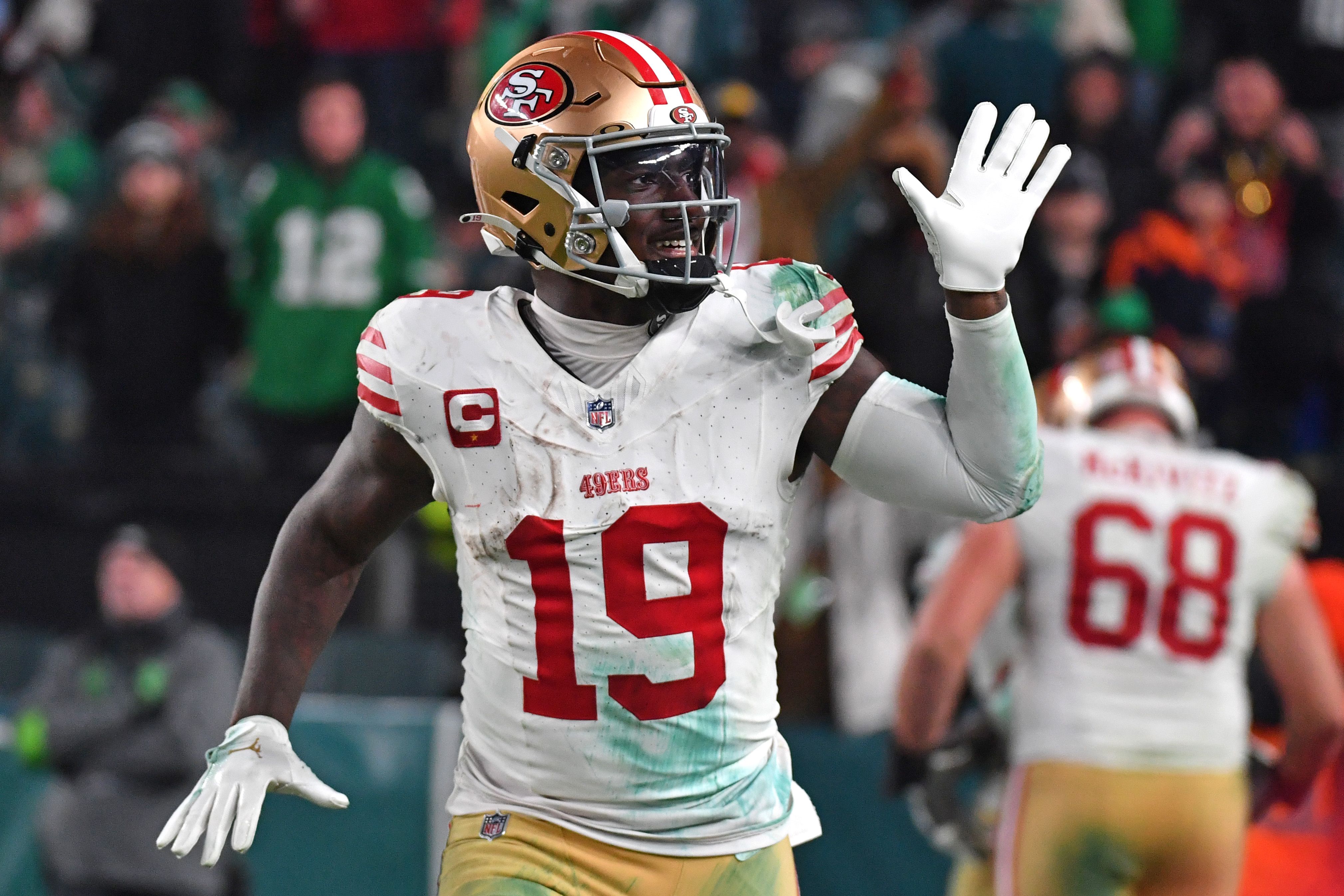 San Francisco 49ers wide receiver Deebo Samuel waves goodbye to the Philadelphia Eagles fans after scoring a touchdown during the fourth quarter at Lincoln Financial Field.
