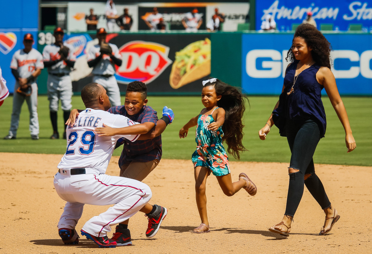 Former Texas Rangers third baseman greets his family, including son Adrian Jr., daughter Canila, and wife Cassandra, after collecting hit No. 3,000 on July 30, 2017, at Globe Life Park in Arlington. Beltre was elected into the Baseball Hall of Fame in his first year of eligibility on Tuesday.
