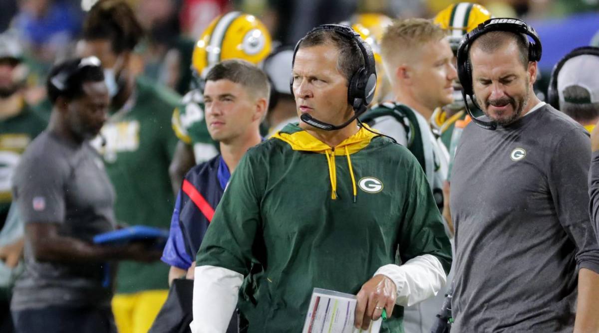 Green Bay Packers defensive coordinator Joe Barry on the sideline during a game.
