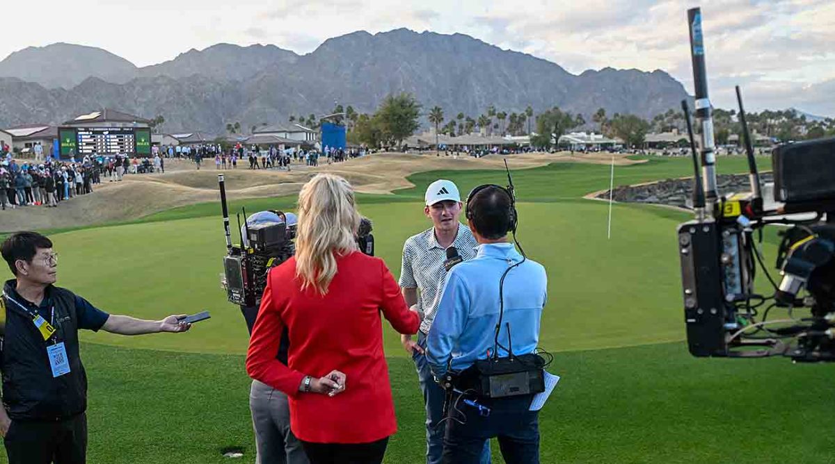 Nick Dunlap (a) is interviewed on the green on 18 after winning the 2024 American Express at PGA West, Dye Stadium Course.