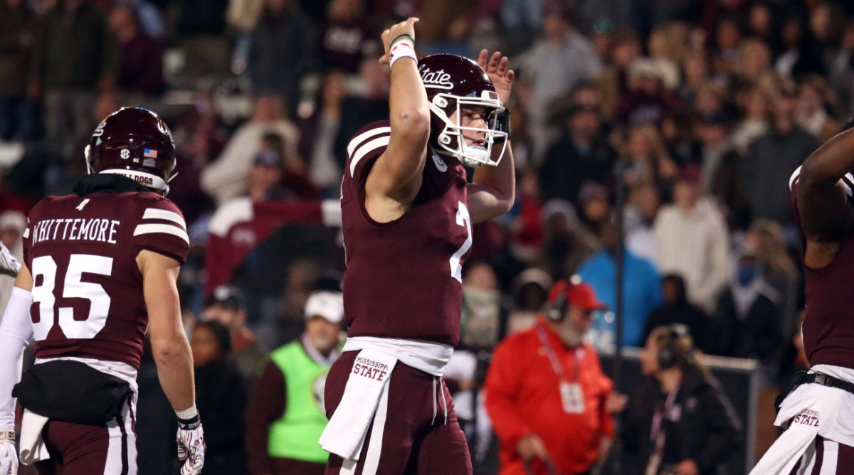 Mississippi State quarterback Will Rogers celebrates a play.