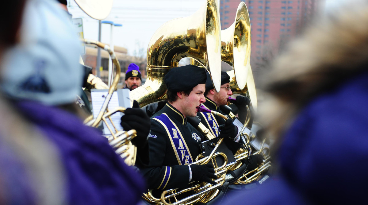 Baltimore Ravens marching band members play music during the Super Bowl XLVII victory parade at M&T Bank Stadium.