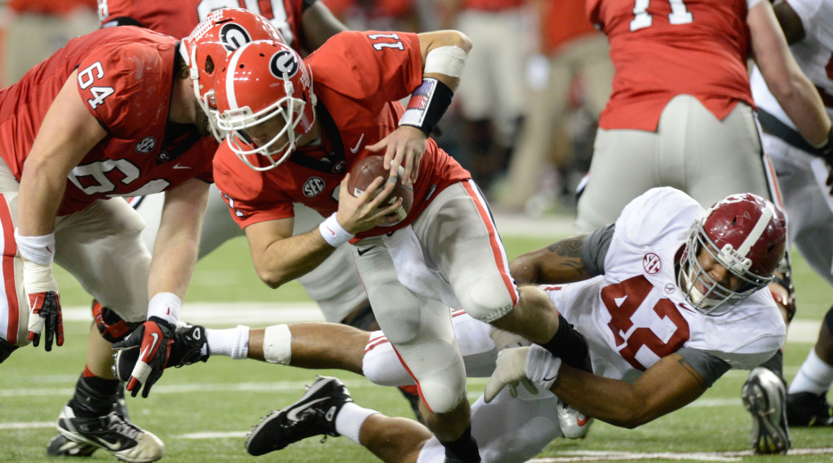 Georgia quarterback Aaron Murray is sacked by Alabama during the 2012 SEC championship.